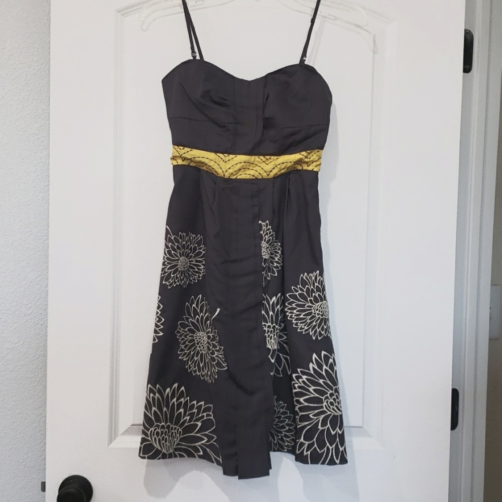 Floreat grey strapless dress with embroidered white flowers, yellow accent